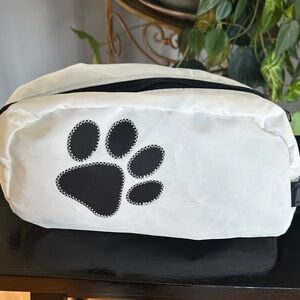 Chic White Toiletry Bag with Black Paw Design made from sails